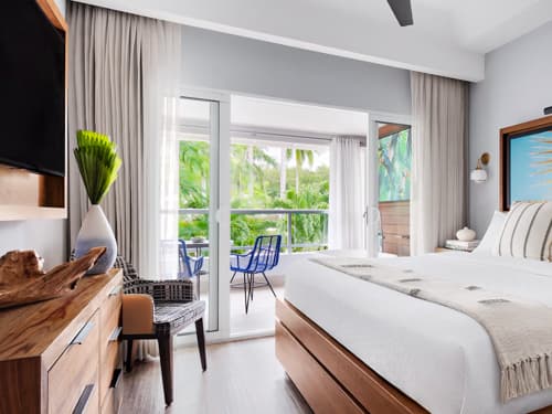 Caribbean Poolside Luxury with Balcony Tranquility Soaking Tub