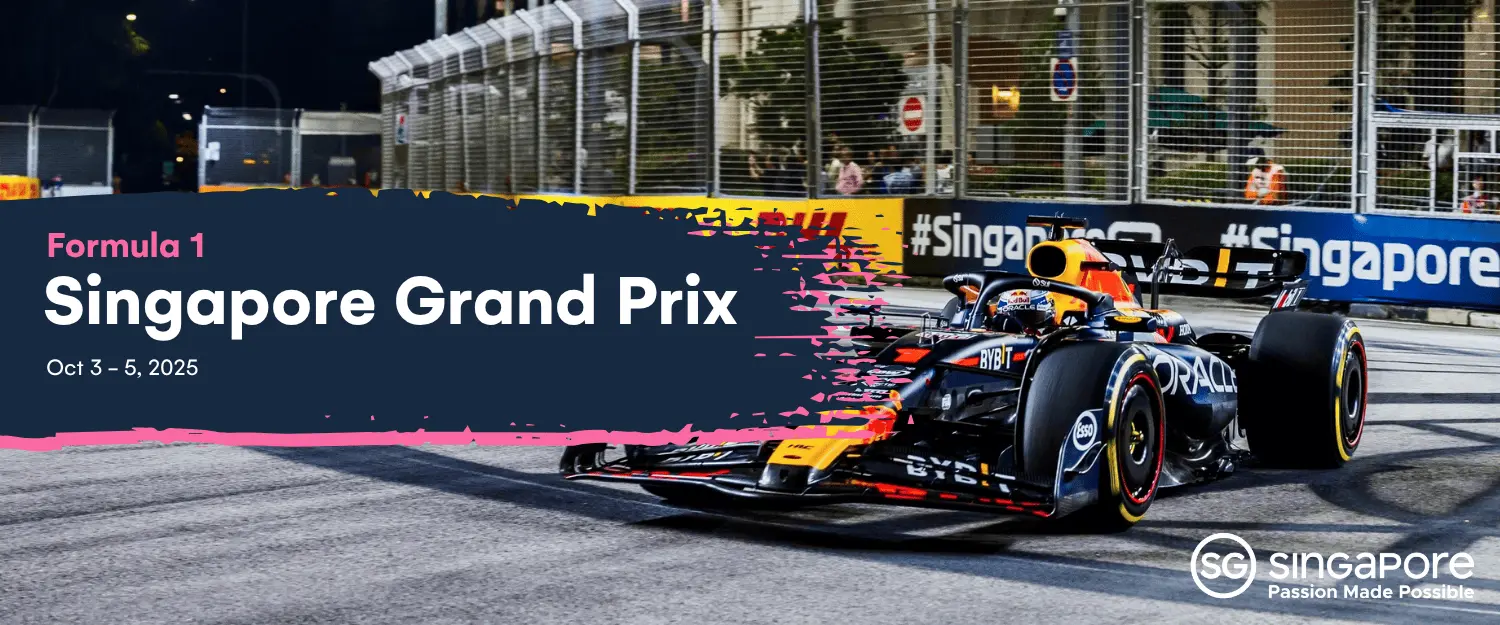 Formula 1 cars racing under the lights at the Marina Bay Street Circuit, Singapore